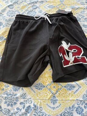 Copper Rivet Black Men’s Athletic Shorts with Red '12' Number and Dove Graphic